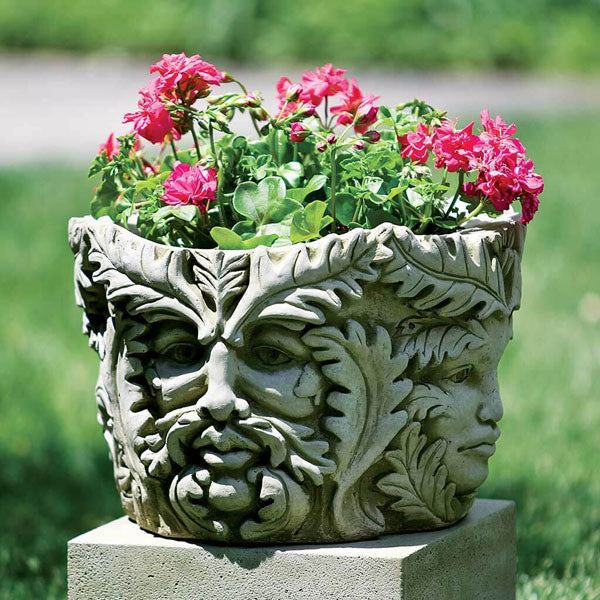 Campania International Sylvan Planter with pink flowers in the backyard