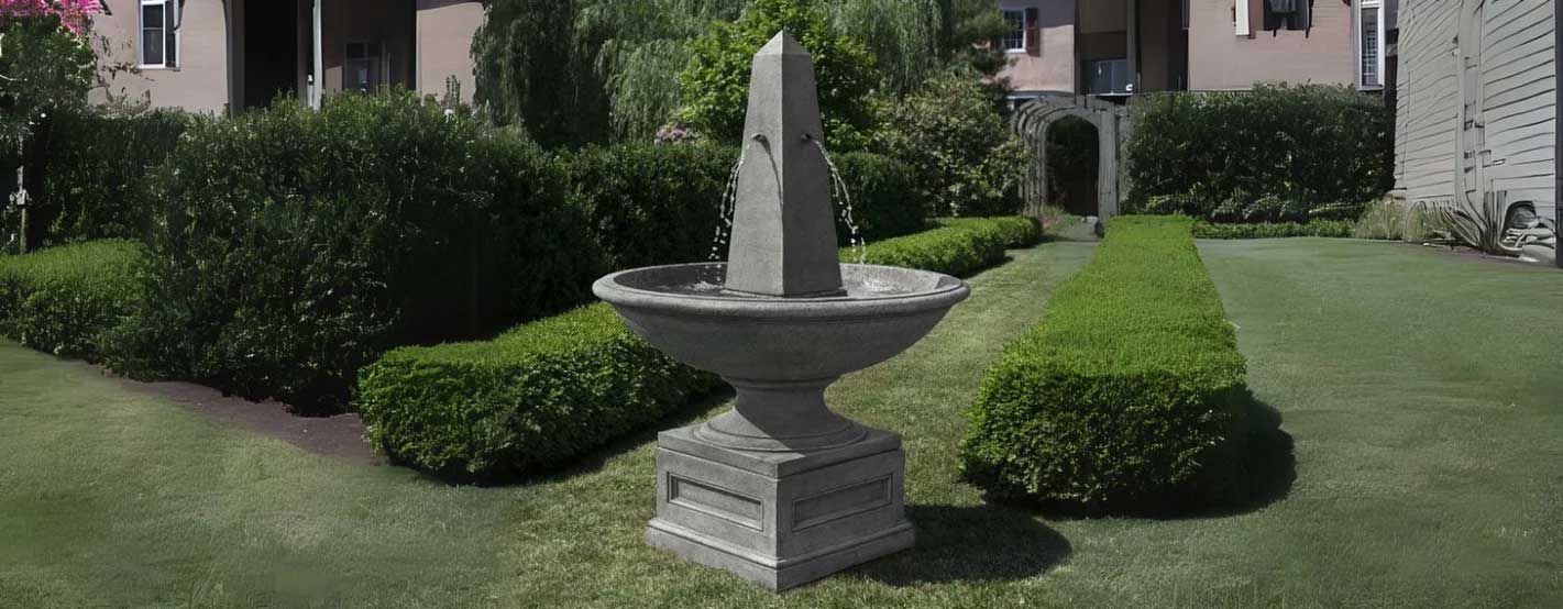 Condotti Obelisk Fountain on grass in the backyard