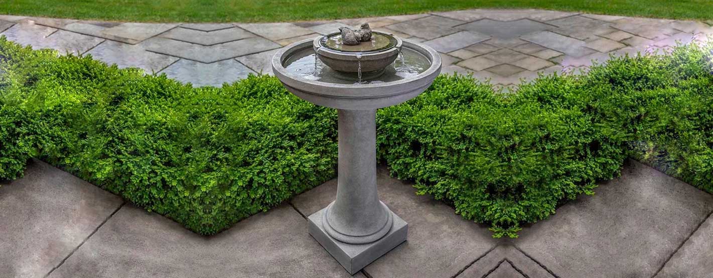 Dolce Nido Fountain on concrete floor in the backyard