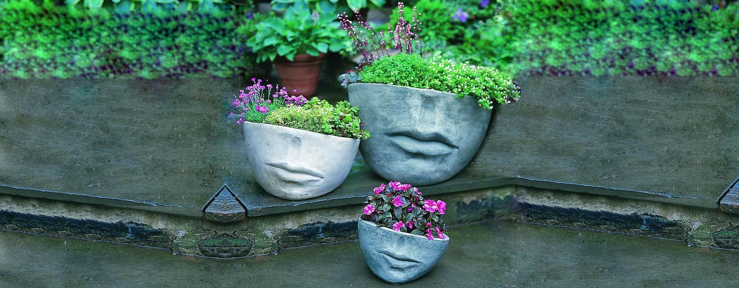 Faccia Planter, Large on concrete in the backyard