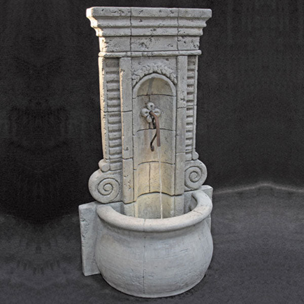 Fiore Stone Champagne Wall Fountain Tall running against gray background