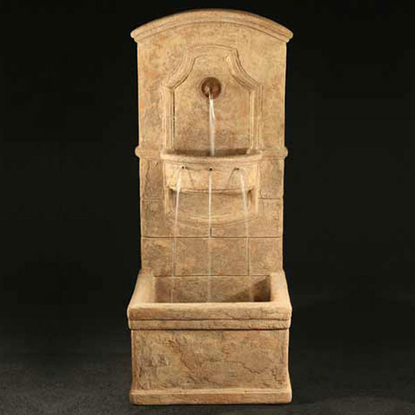 Fiore Stone Di Amico Wall Fountain running against black background