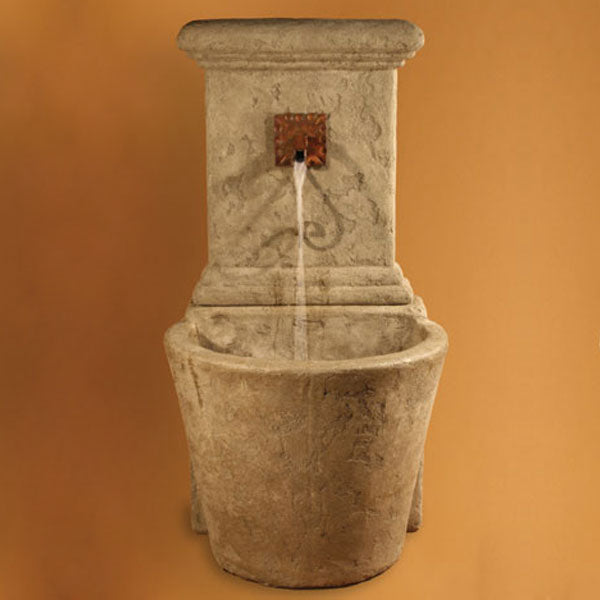 Fiore Stone French Wall Fountain running against brown background