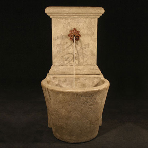 Fiore Stone French Wall Fountain with Star Spout running against black background