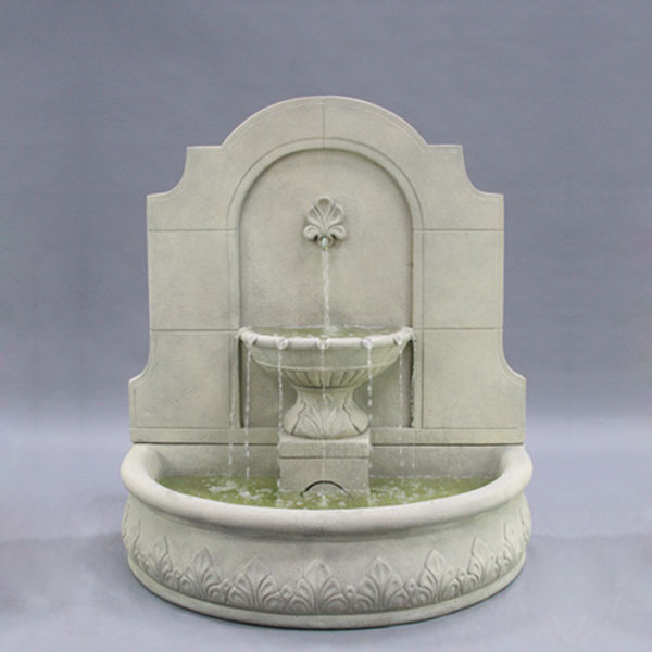 Fiore Stone Provincial Wall Fountain running against gray background