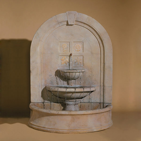 Fiore Stone Seasons Change Wall Fountain running against brown background