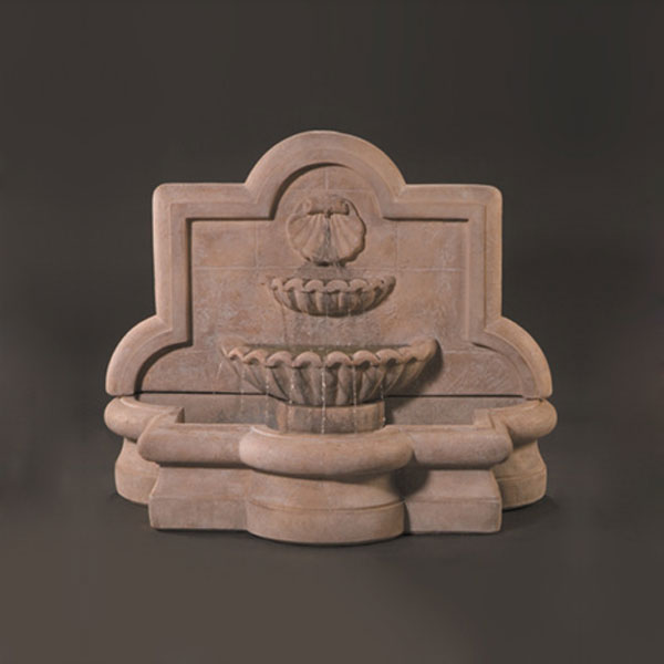 Fiore Stone Shell Quatrefoil Wall Fountain Large running against gray background