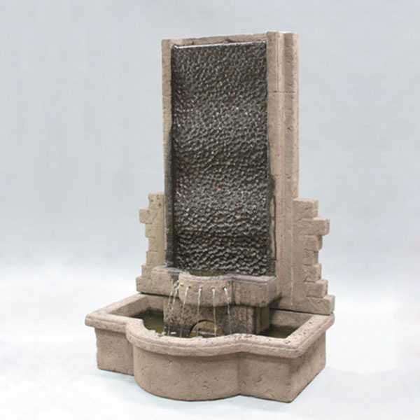 Fiore Stone Tranquility Wall Fountain running against gray background