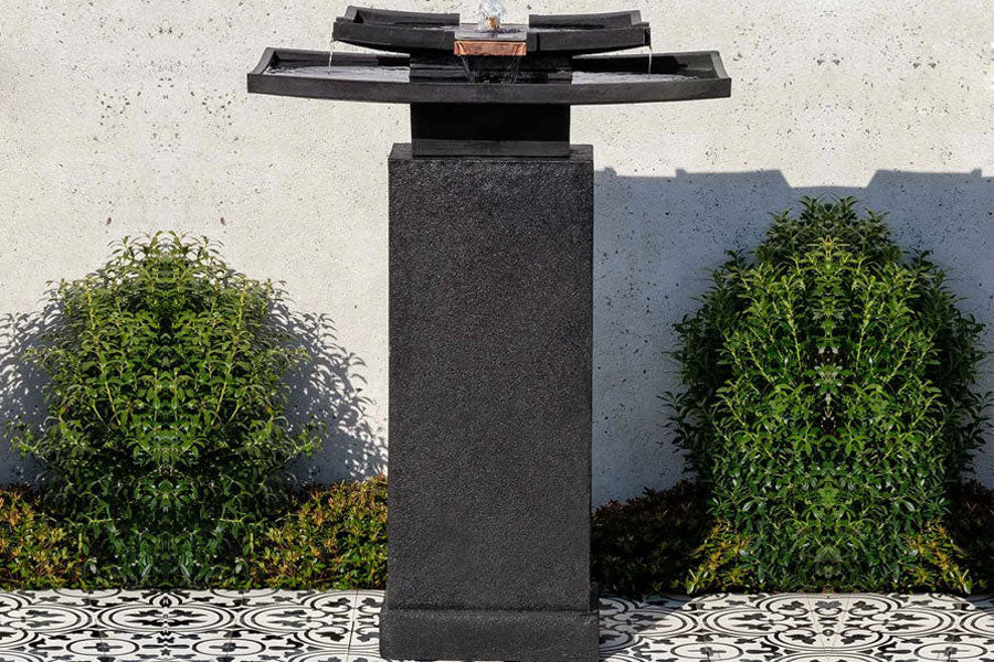 Katsura Fountain with pedestal in nero nuovo in action