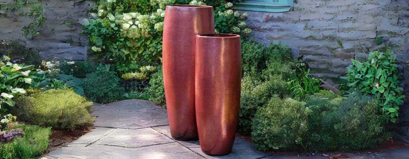 Sabine Planter, Tall - Maple Red S/1 on concrete in the backyard