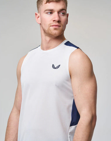 Man in white gym vest/tank top