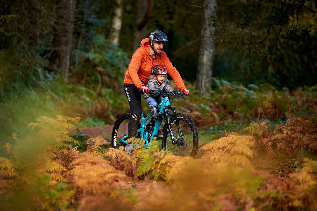 Dad and daughter hunting puddles