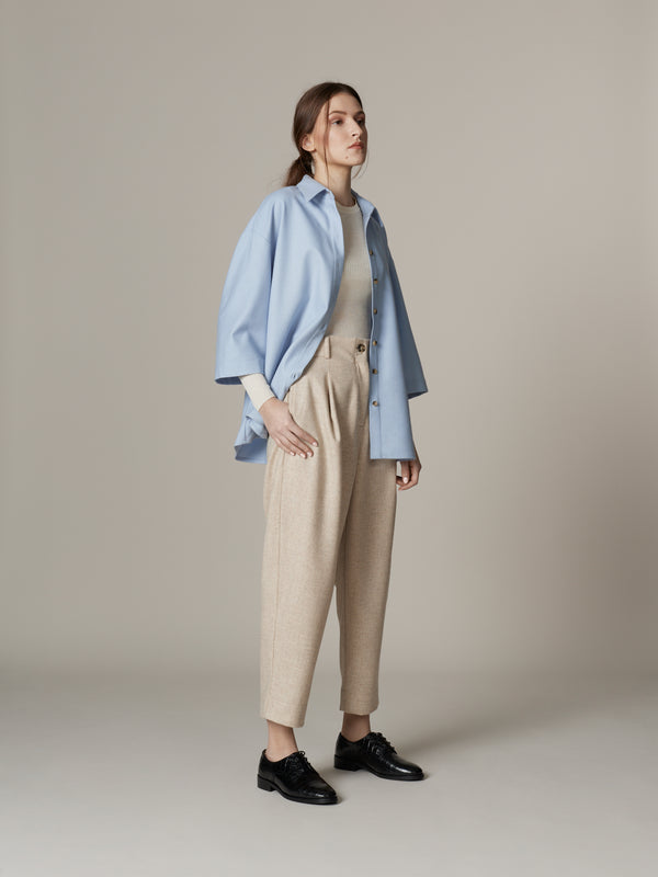Minimalist sleek pastel blue and beige wool outfit