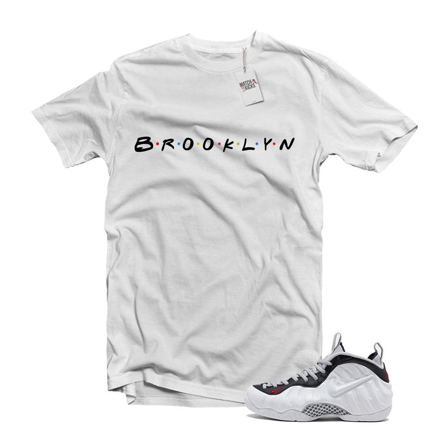 nike air foamposite pro white black university red shirt