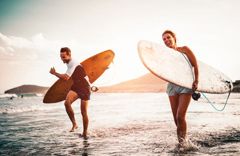 Happy Surfing Couple