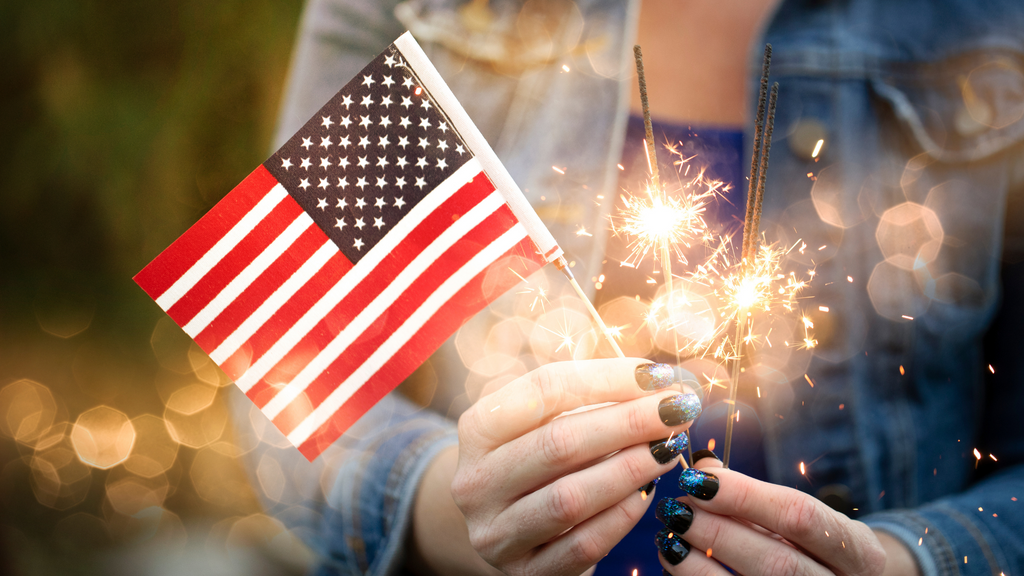 4th of july party decor ideas, american flag in woman's hand