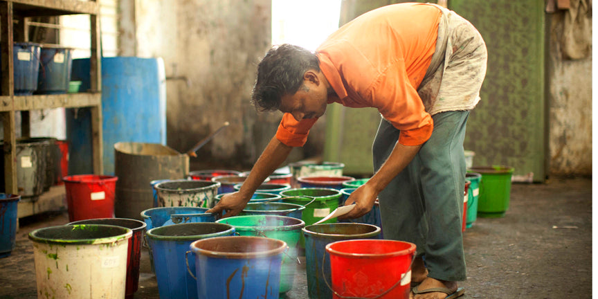 Color master checking the natural silk dyes for silkscreen printing