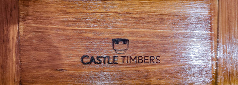 Castle Timbers brand on wood surface