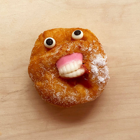 Jam-donut-with-scary-teeth-and-eyes