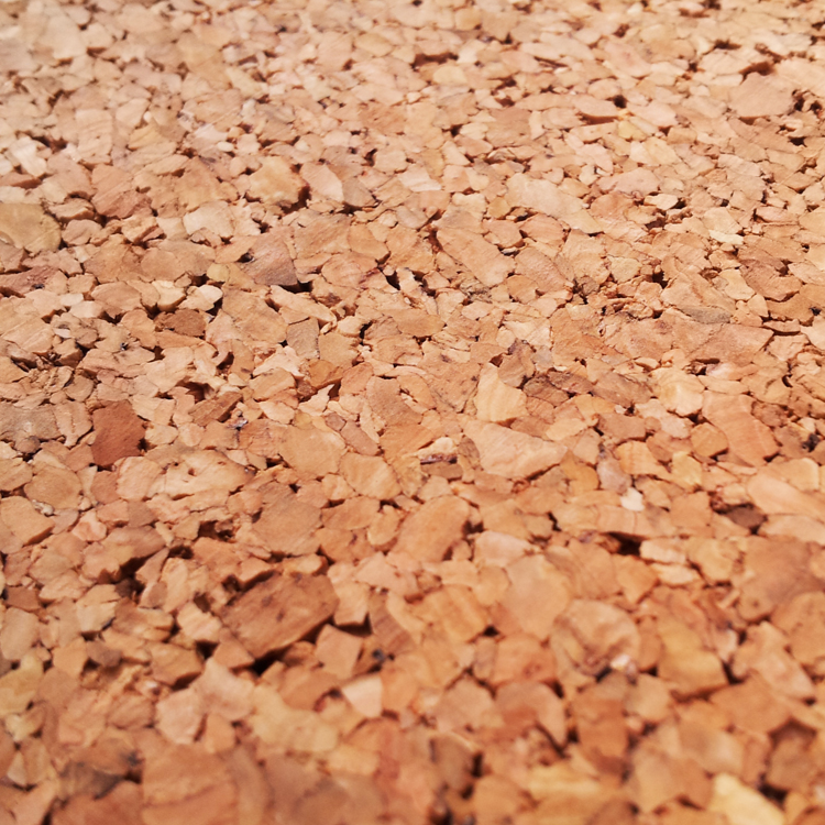 OwnIt cork exercise mat laying next to the competitor's mat. This image shows how much longer OwnIt's mat is by comparison