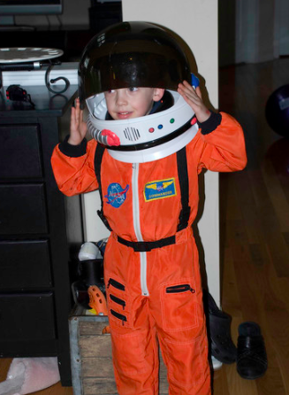 little boy dressed up as an astronaut 