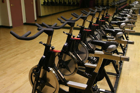 Line of Elliptical Bikes at Gym