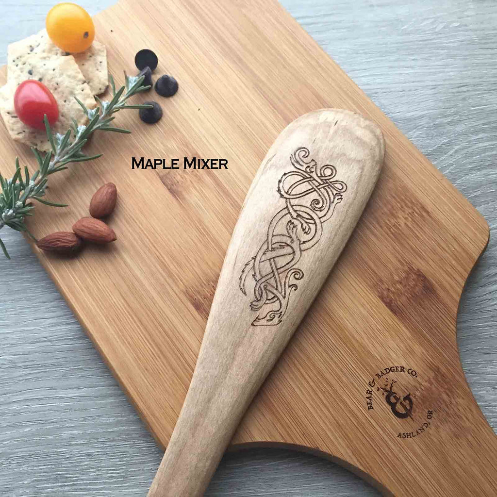https://cdn.shopify.com/s/files/1/0318/7920/0904/products/Dog-and-rabbit-knotwork-on-maple-mixer-wooden-spoon-utensil-ashland-oregon-local-gift_1024x1024.jpg?v=1586107041