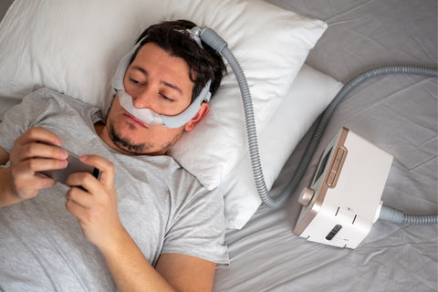 man using CPAP therapy