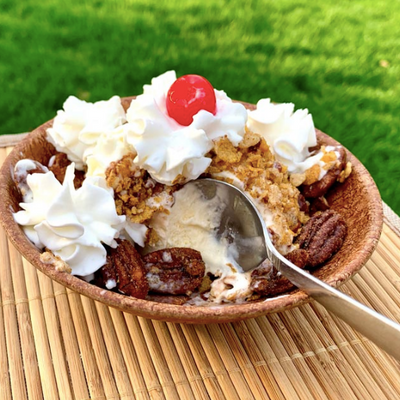 The Spicy "fried" ice cream with whipped cream and a cherry on top