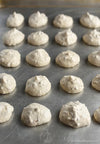 Baking sheet with crispy meringue cookies