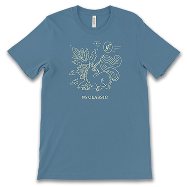 blue t-shirt with squirrel unicorn character and "The Classic" text printed on the front
