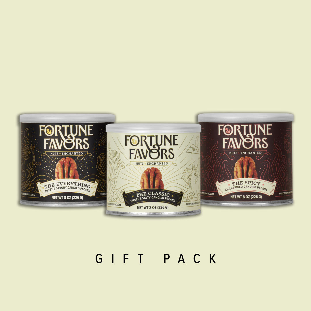 three cans of Fortune Favors candied pecans