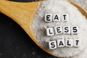 Most people can lower their blood pressure by eating less salt.