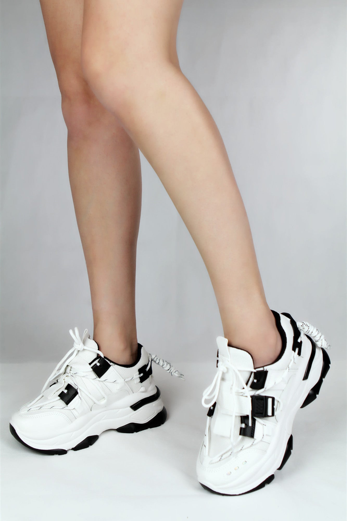 chunky sole white trainers