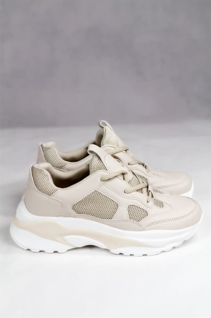 white and beige chunky trainers