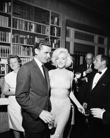 Marilyn Monroe wearing the iconic Happy Birthday Mr President dress