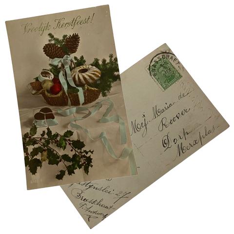 Vintage Christmas postcard of gift basket