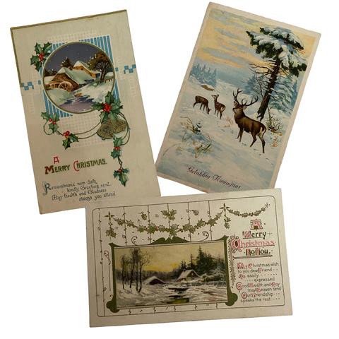 Vintage Christmas postcards of country scenes and reindeer