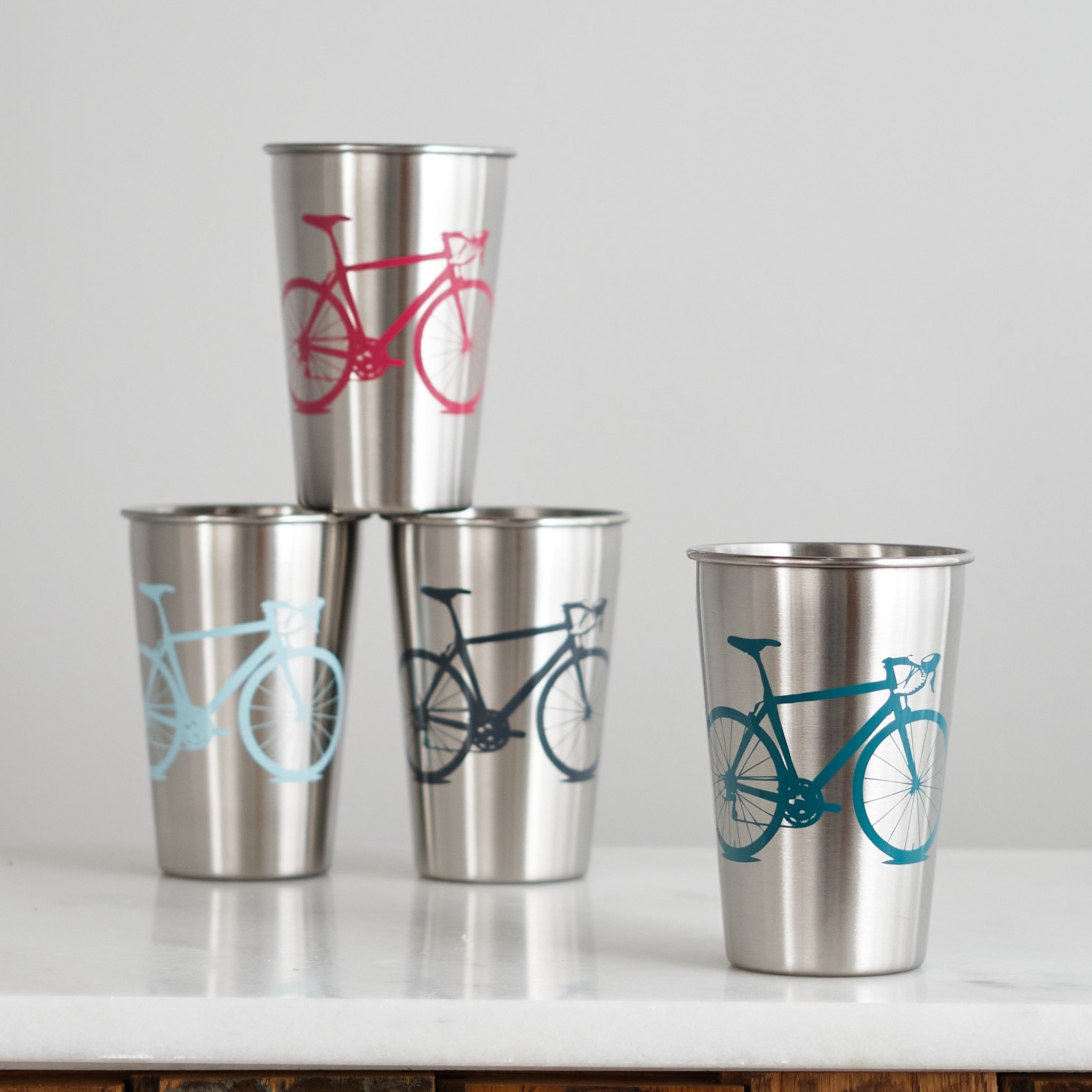 https://cdn.shopify.com/s/files/1/0319/4342/6187/products/vital-industries-bicycle-stainless-steel-tumblers-vibrant-set-of-4-assorted-colors-37149124395222.jpg?v=1648473838&width=2048