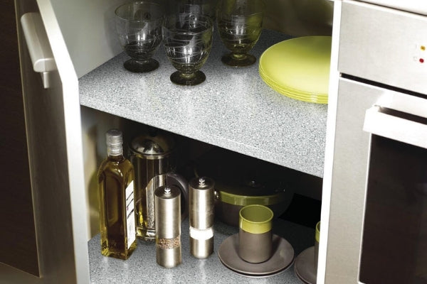 Sabbia grey vinyl used as shelf liner in open kitchen cupboard