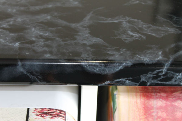 close up of black marble bench top