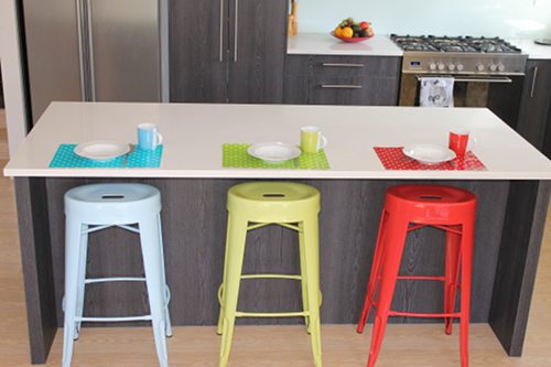 breakfast bar set with blue, green and red bar stool and matching placemats