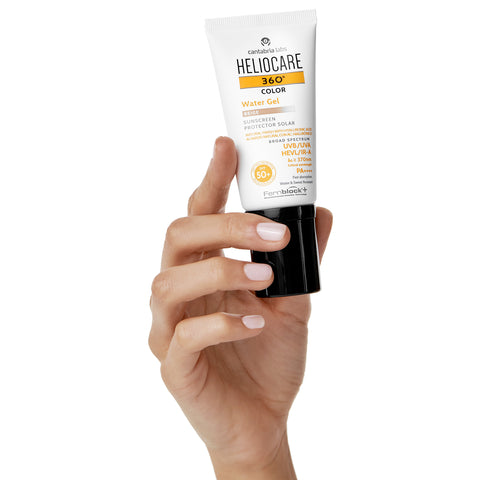 Hand holding Heliocare 360° Beige Color Water Gel