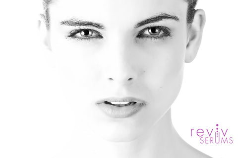 Woman face Reviv logo