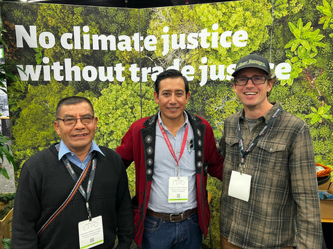 Our head roaster Brian standing with two of our farmers from Guatemala