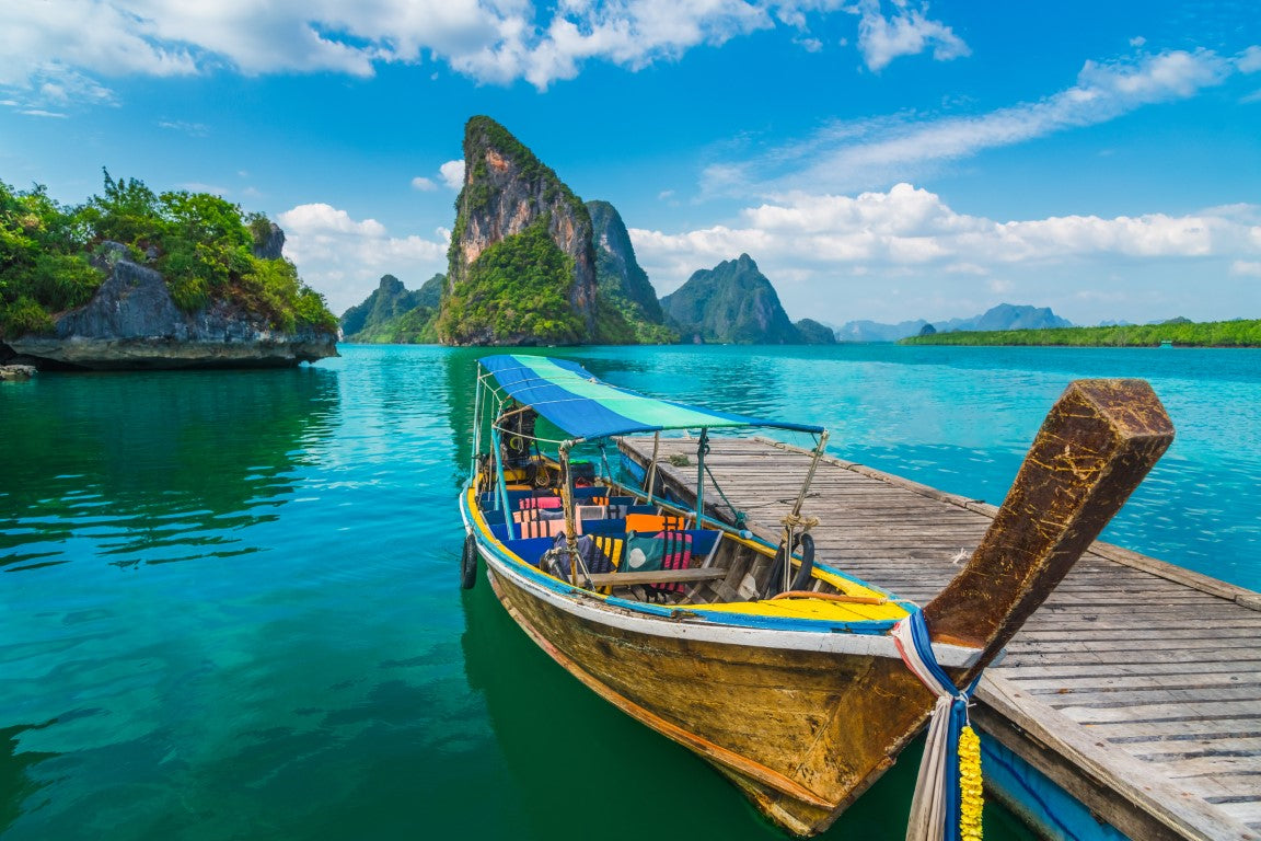 Phang-Nga-bay-with-wooden-boat-Water-travel-adventure-Phuket-Thailand.