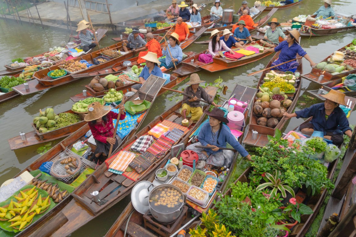 Take A Boat Tour Of The City And Visit The Floating Markets