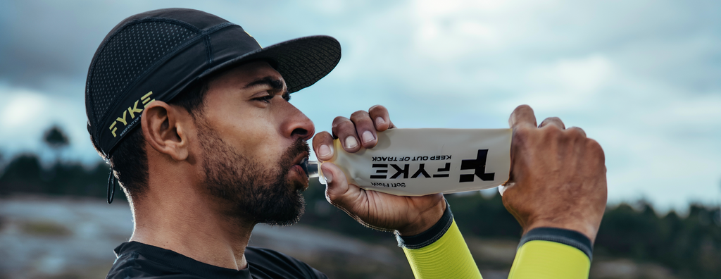 Man drinking from Fyke's Soft Flask