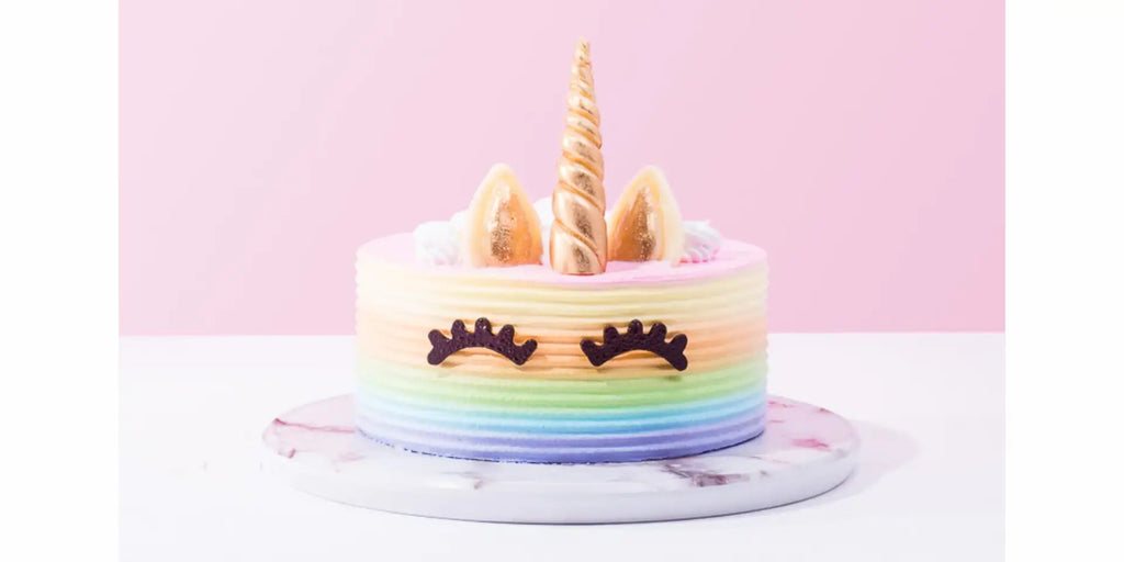 heavenly unicorn first birthday cake