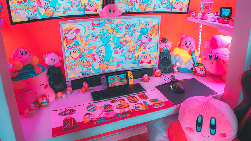 A pink tone video gaming room with a Kirby theme